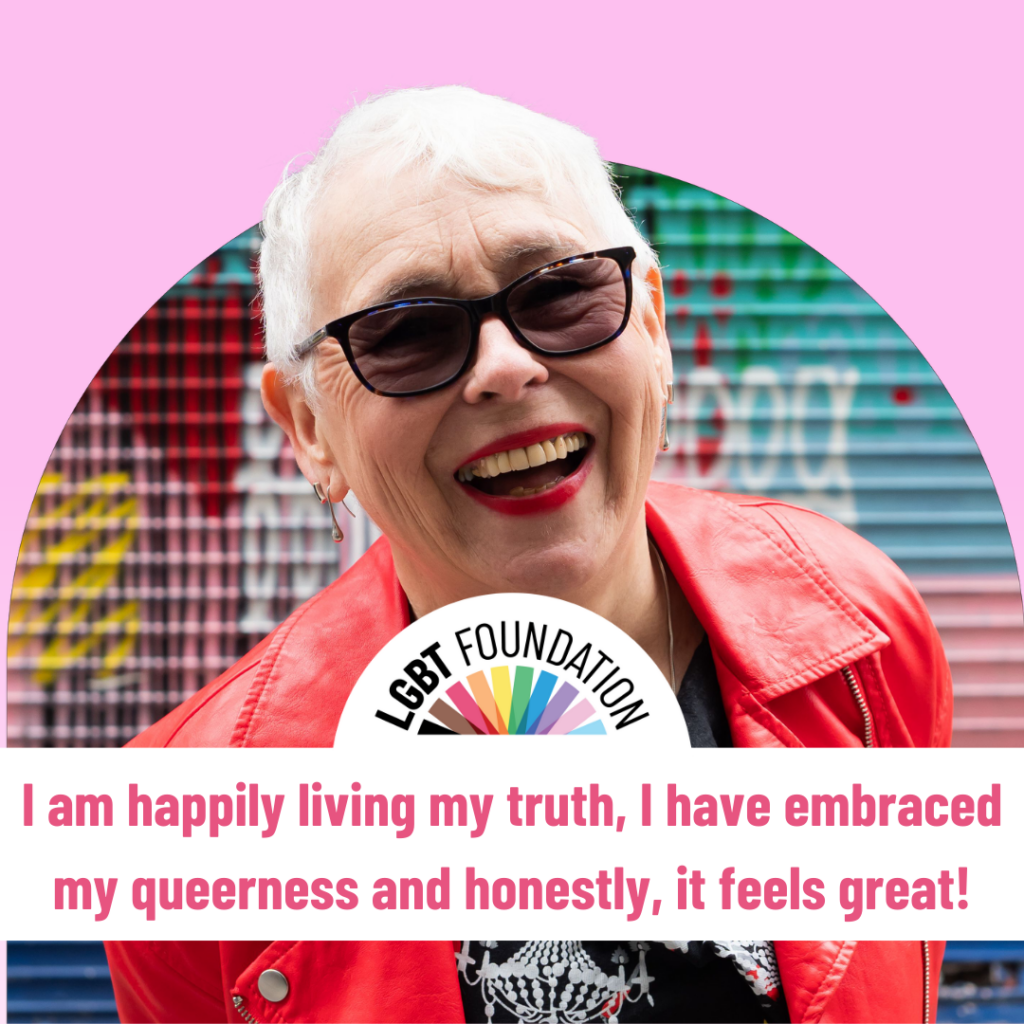 A pink framed image of an older queer women with the quote "I am happily living my truth, I have embraced my queerness and honestly it feels great!"