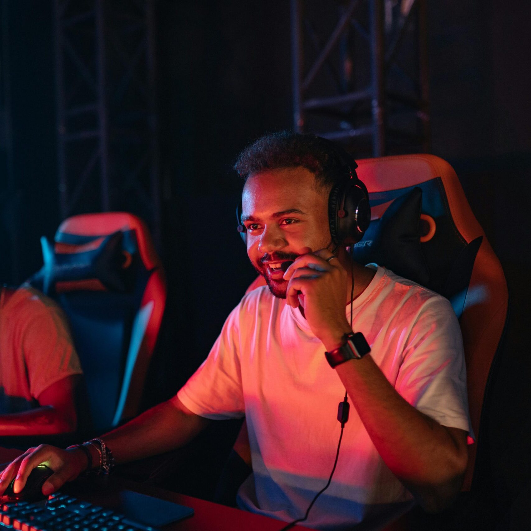 POC streamer talking into headset while streaming